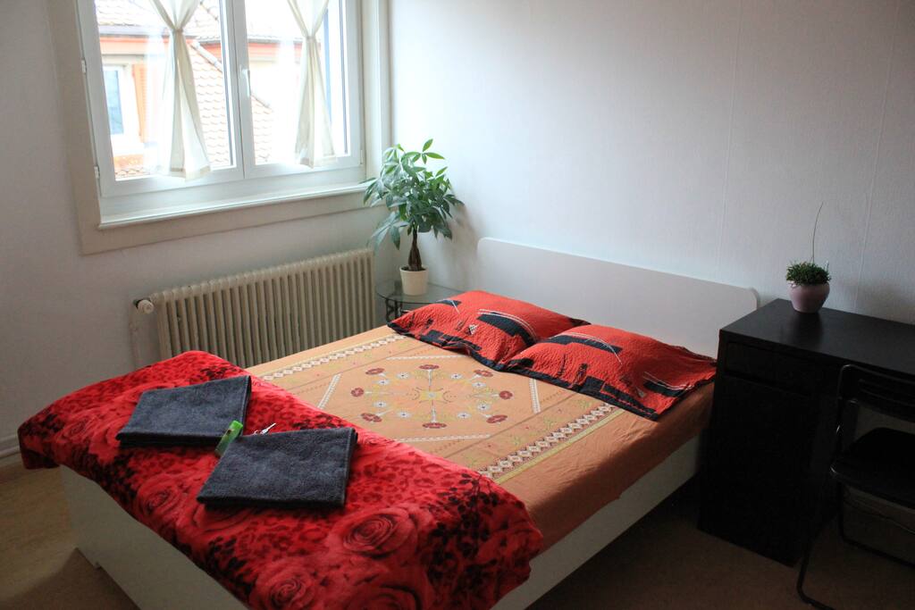 A cozy bed for two persons.