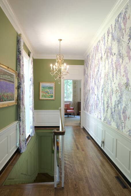 Hallway between suites and stairway to Garden Level Area at left