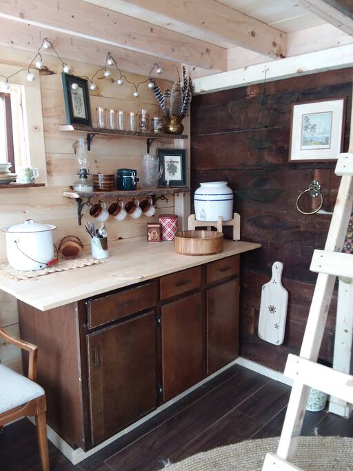 The cabin has a 5 gallon water jug and sink for drinking and cleaning up