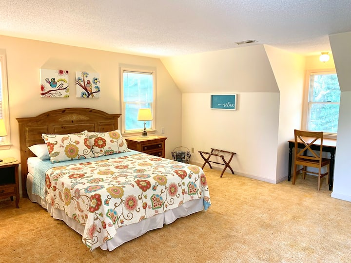 The upstairs queen bedroom has a great workstation and lots of floor space. 