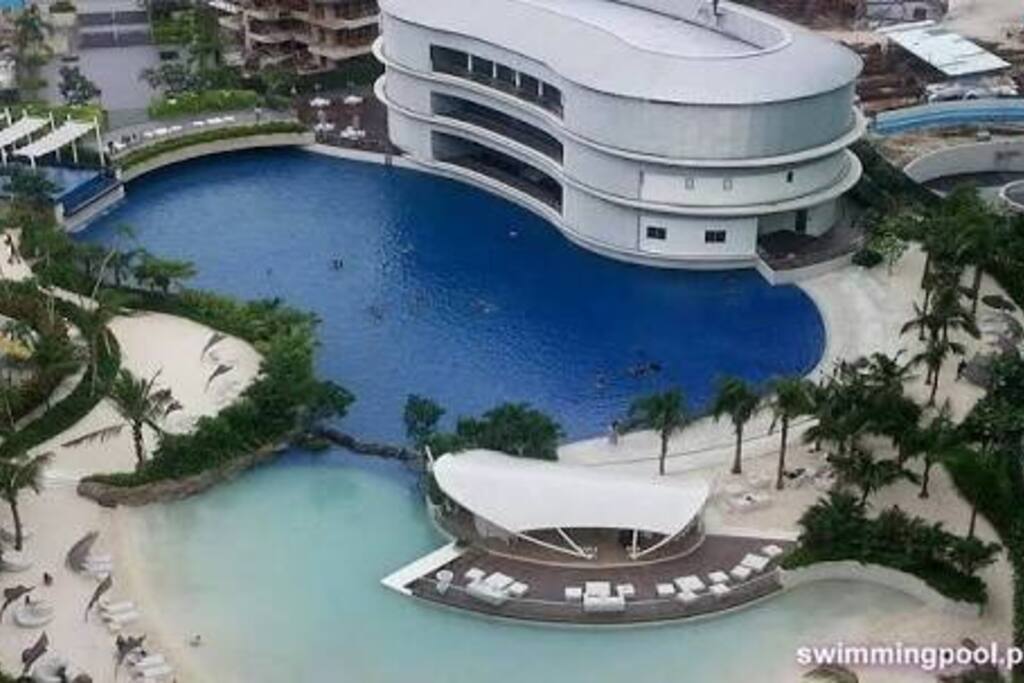 Man made beach and pools with waves