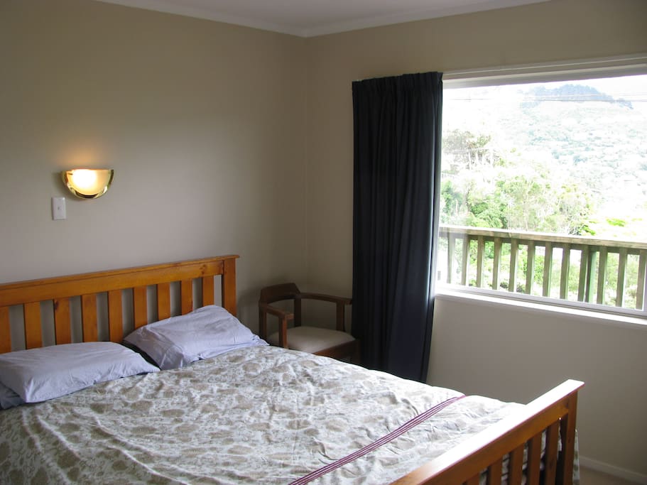 Large double bedroom with queen sized bed and great views.