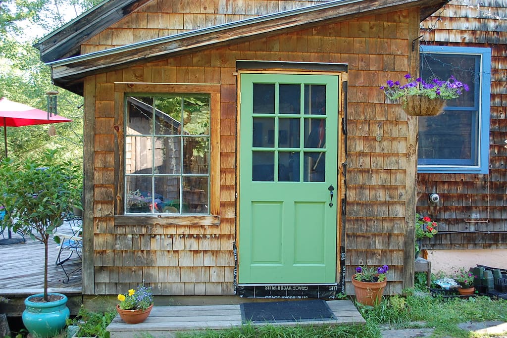 This is the door to mudroom where you can hang your towels in Summer, your sweaters in the Fall or your coats in Winter