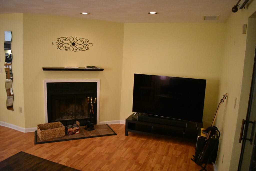 65" TV & Fireplace in living room