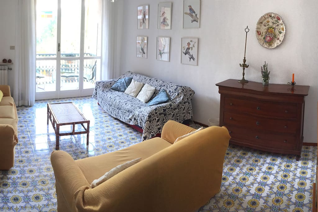 The lounge with three sofas and west facing view