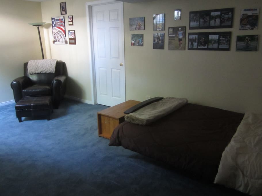 Basement room with lounge chair