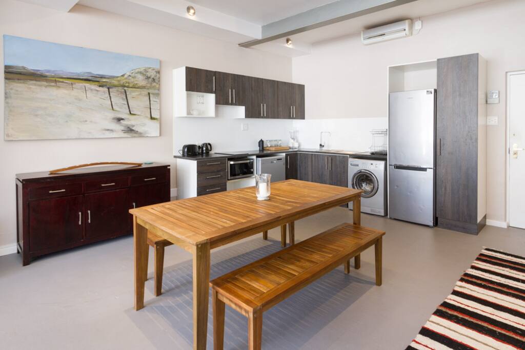 Fully-fitted kitchen and dining area.
