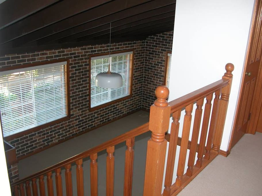 Living area of 4 split level townhouse. 4 rooms available: the triple bunker, double , double w'ensuite, or the single room