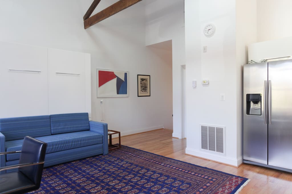 View of the living room and top of the stairs.