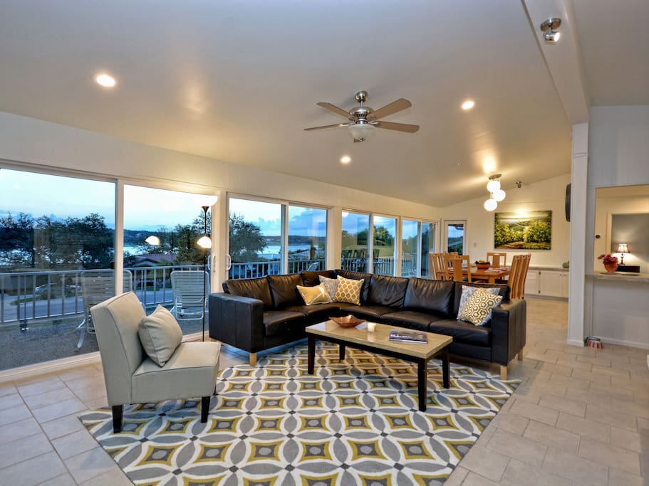 Views of Lake Travis and the Hill Country continue in the elegant living area.