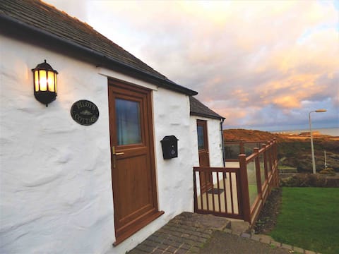 Pilot's Cottage, with stunning sea views.
