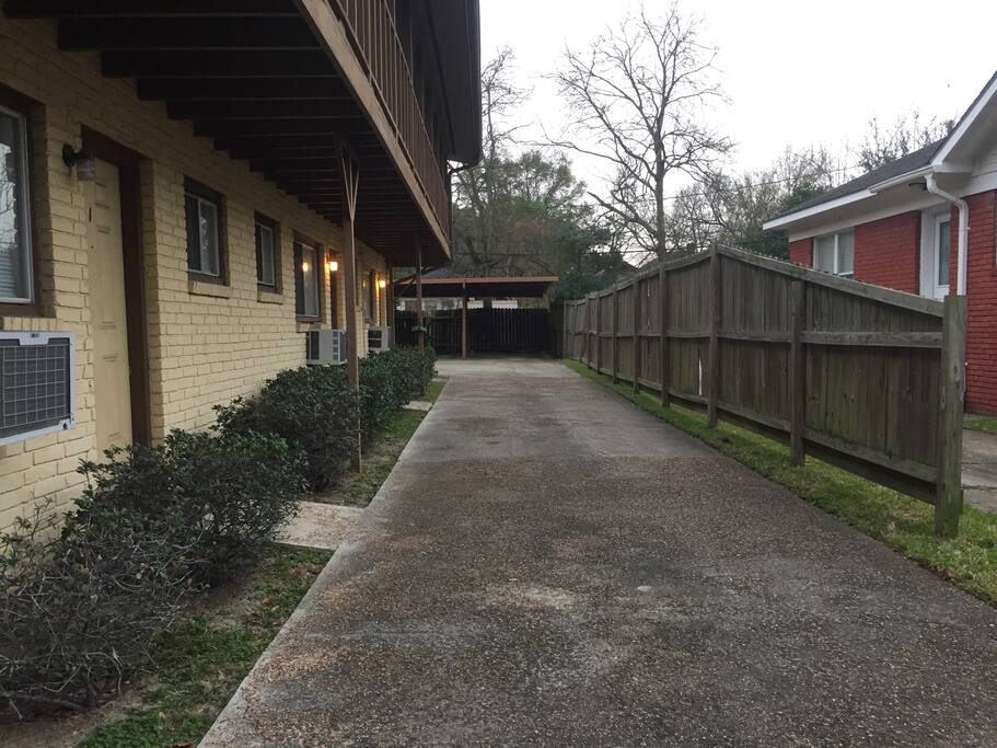 Driveway to car port. One vehicle free parking free of charge. Otherwise street parking is available.