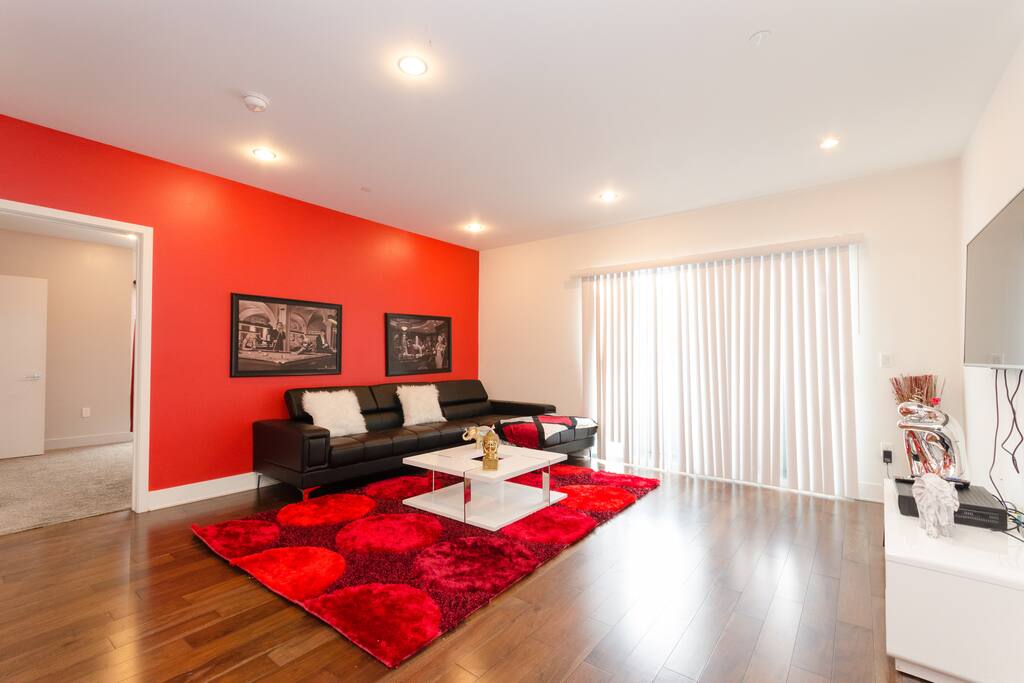 Italian leather sectional and HD TV in living room