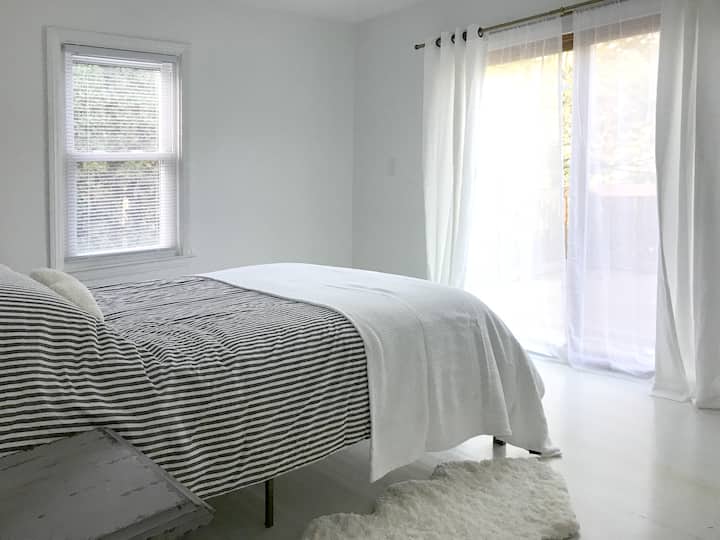 Master bedroom with patio access.