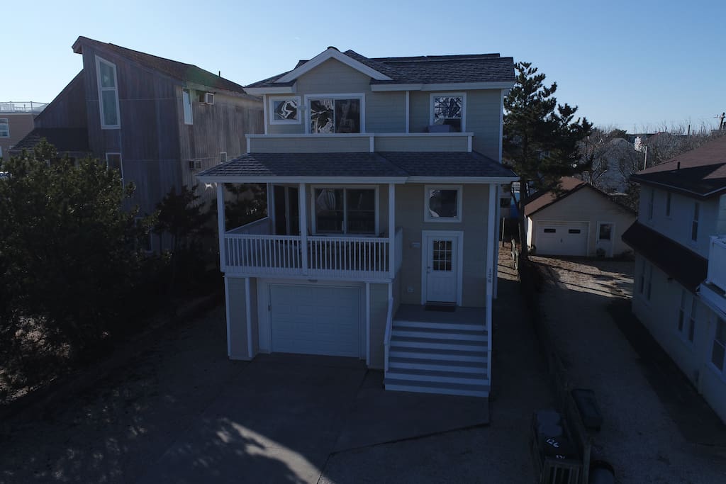 Front of house showing two decks.