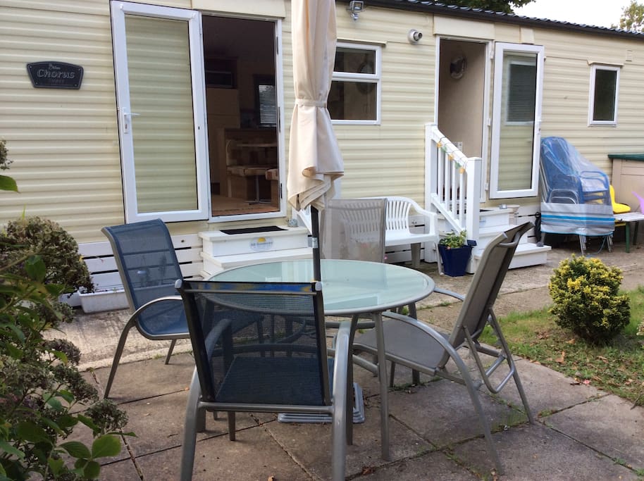Patio area in front of boundary bank with a degree of privacy.