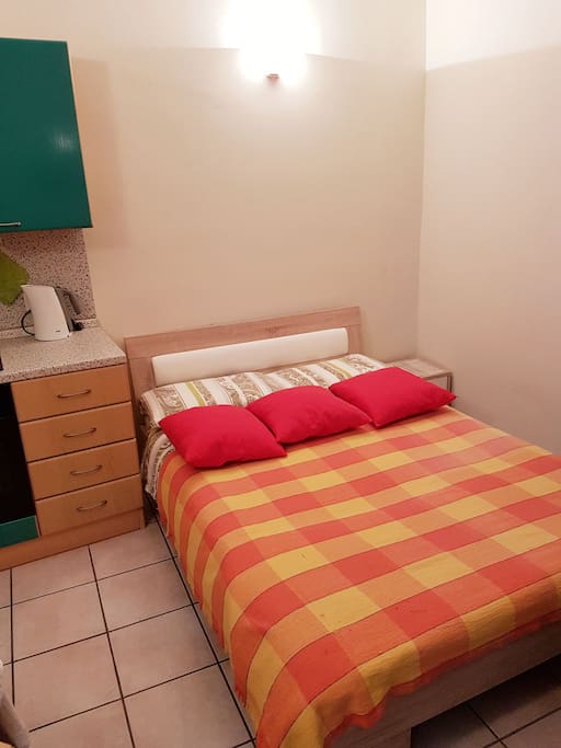Double-bed is in the main room, kids bedroom is separate