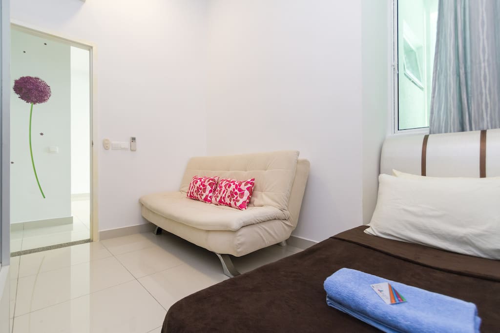 single bed and a sofa bed