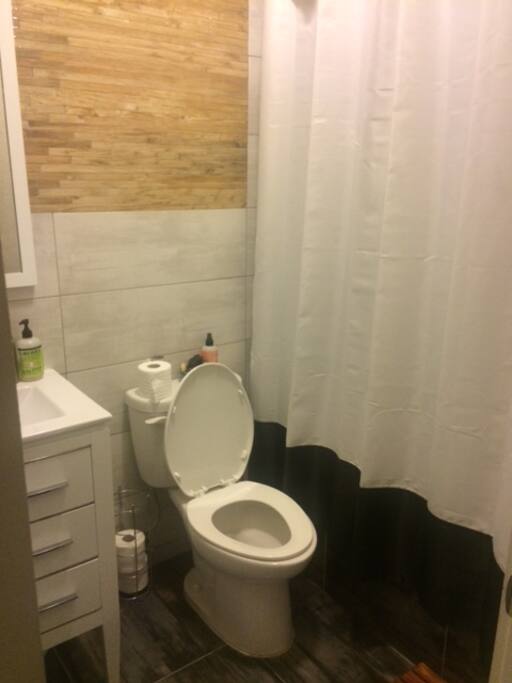 Full bathroom directly outside of available bedroom.