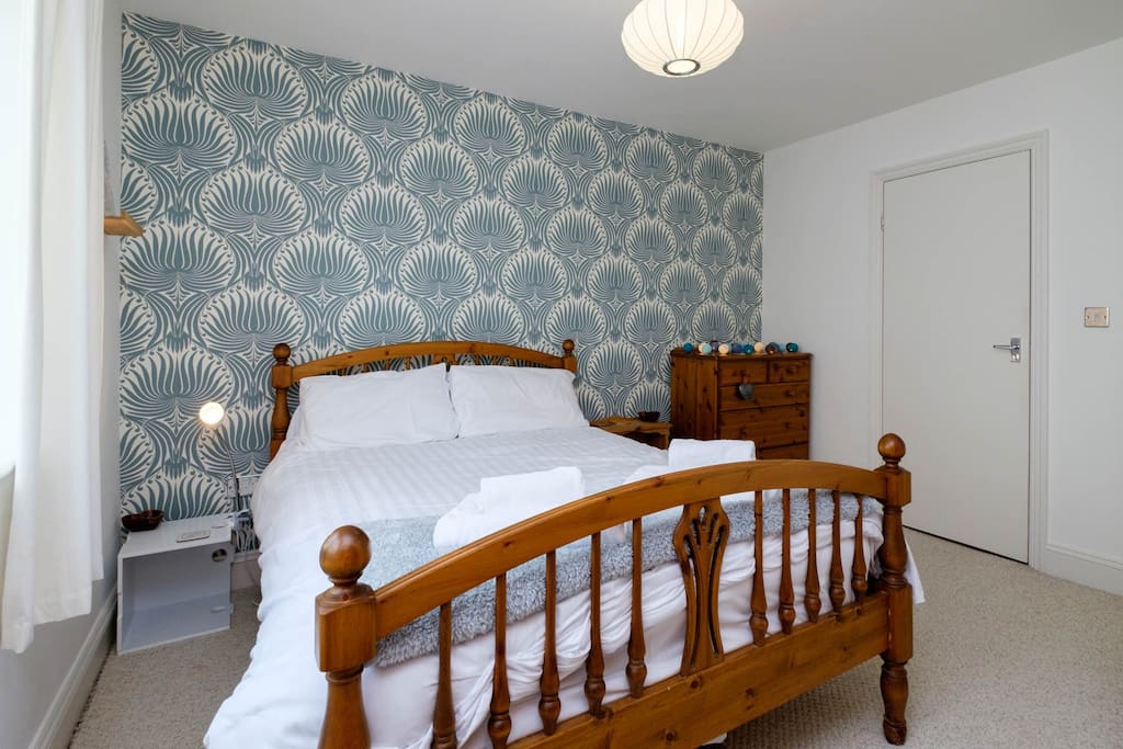 The master bedroom with an ensuite shower room