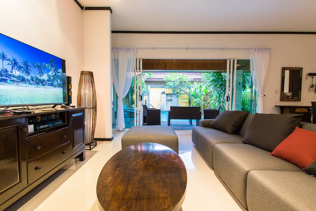 Open Living Room with Longer Sofa & Satellite TV over 200 TV and Radio Channels in all Different Languages with Pool and Garden View.