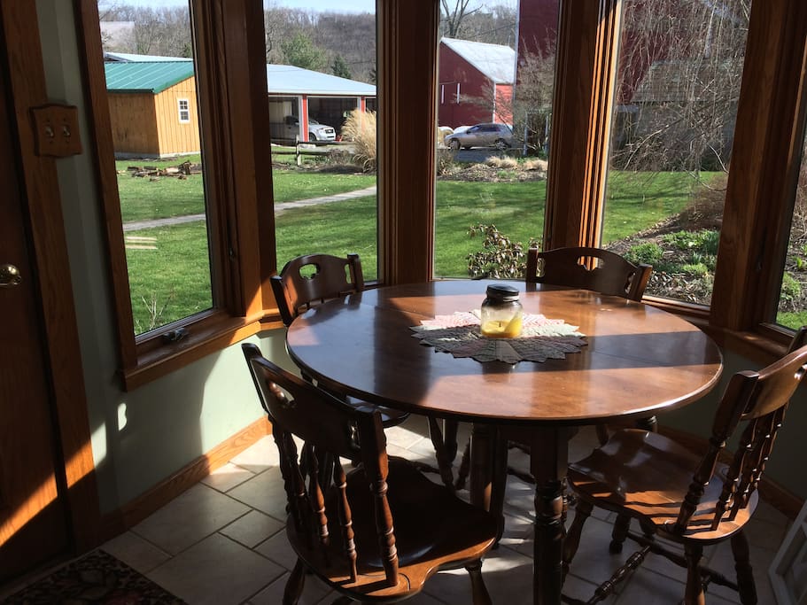 Enter through the sun room that connects the farmhouse with the brick Pappy House.