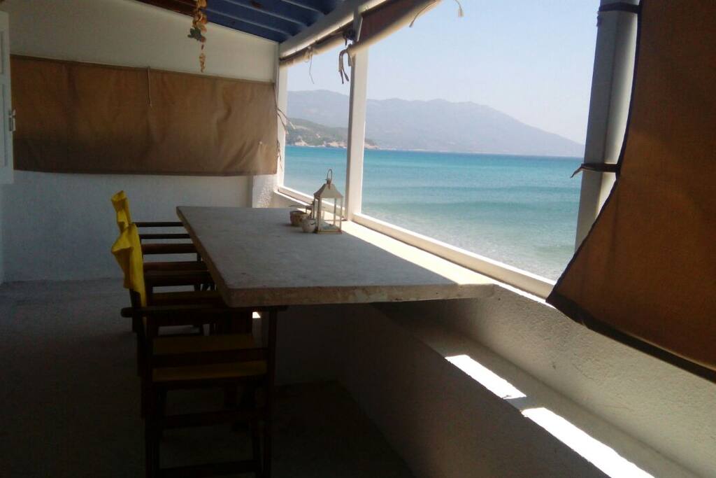 COVERED VERANDA OVERLOOKING THE SEA