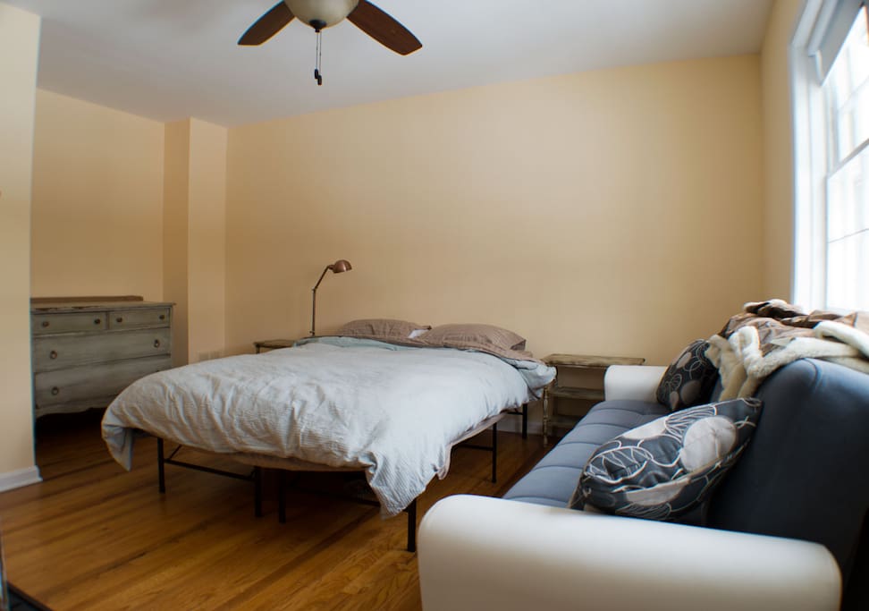Bedroom 1. Queen sized bed and futon. Futon folds out to a single bed. Master bathroom is attached to this room.