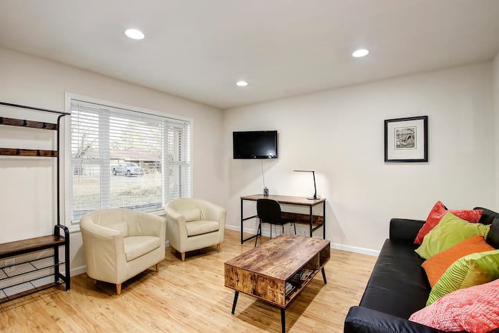 2nd living area with sleeper couch, desk area and TV