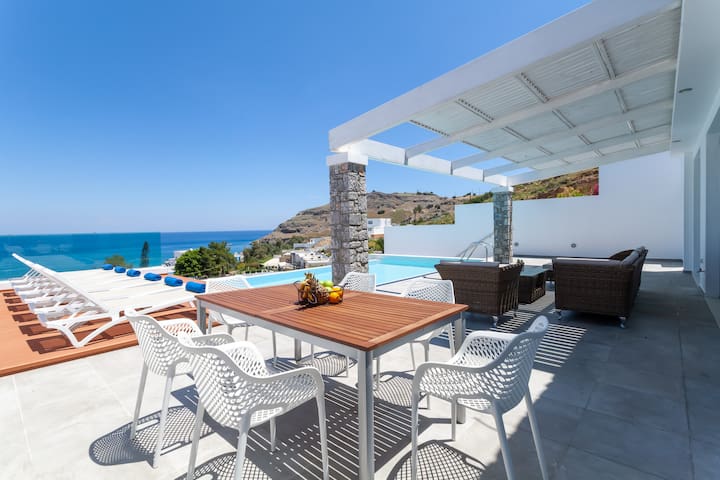 Stylish Sunrise White Villa with Infinity Pool