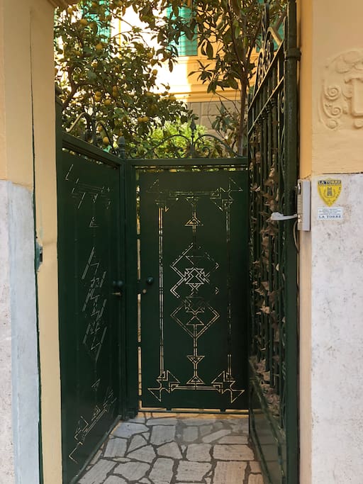 the entrance in your magic roma garden house between a lemon tree