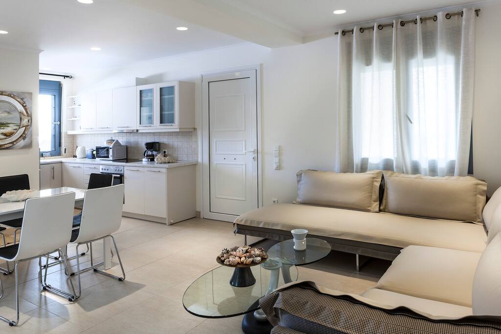 Living room area with kitchen