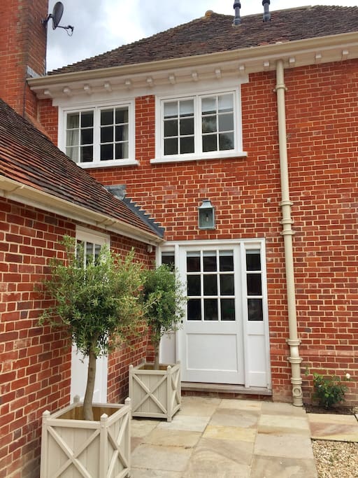 Welcome to The Housekeepers Cottage at Martyr Worthy Place - your own private entrance