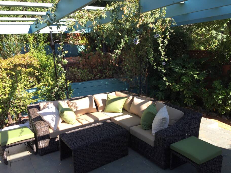 Backyard patio where hummingbirds and butterflies like to keep you company