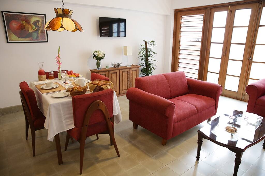 Dining area, living, balcony door at the back
