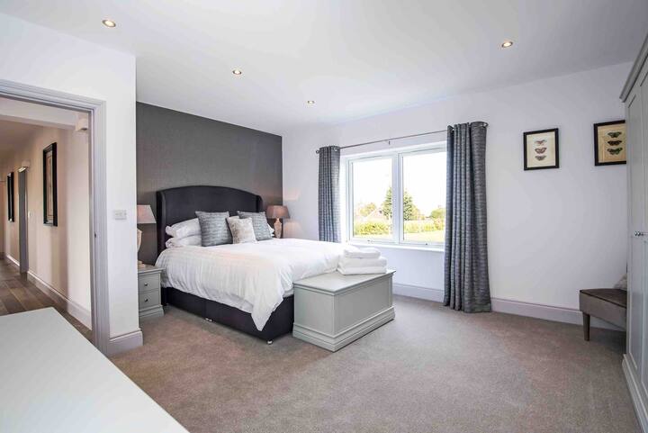 Bedroom 1- Master with king size bed and lots of storage. This room has views over the fields 