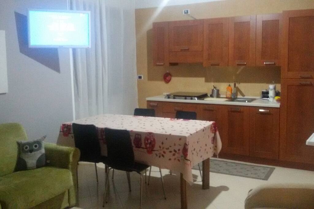 Soggiorno con angolo cottura