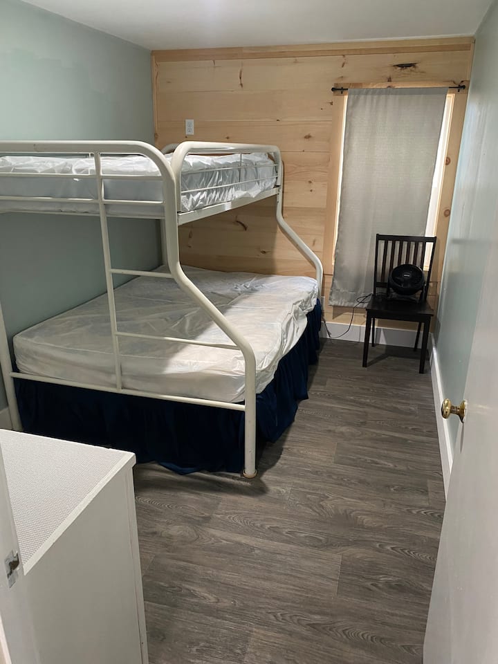 2nd bedroom: full bunk bed with twin upper. There is also a twin is located under the bed on wheels.

*no linens included! Bring full/twin linens! 