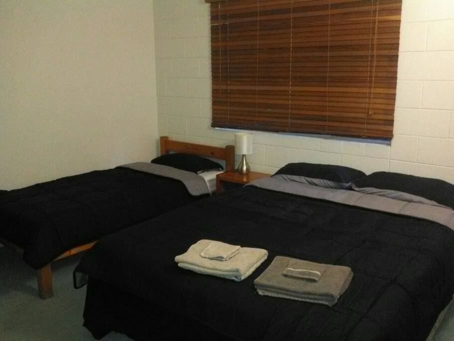 Your extra large bedroom, consisting of 1 Queen size & 1 single bed