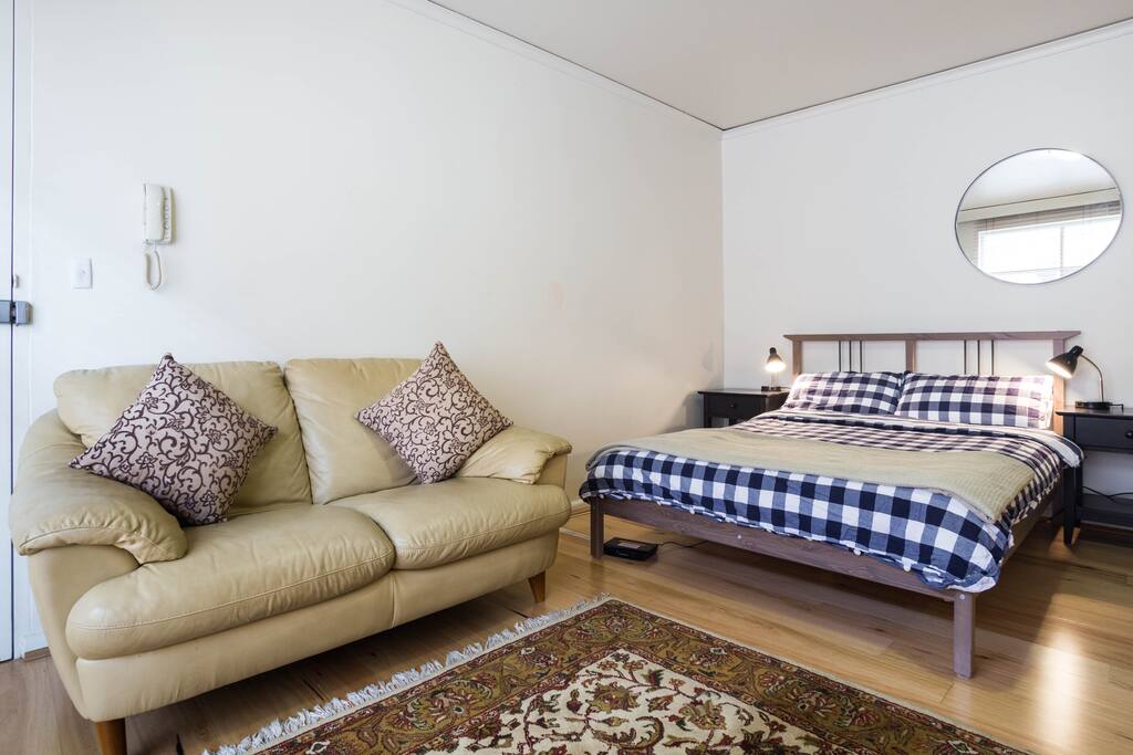 Double bed and 2 seater couch