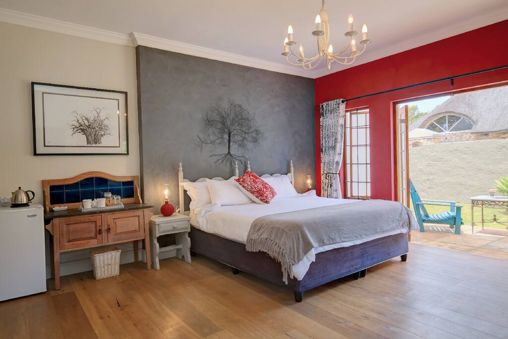 Room 1 Tree of Life - Luxury King Suite with king size bed and extra length. Fridge, Kettle, tea & coffee available in the rooms.