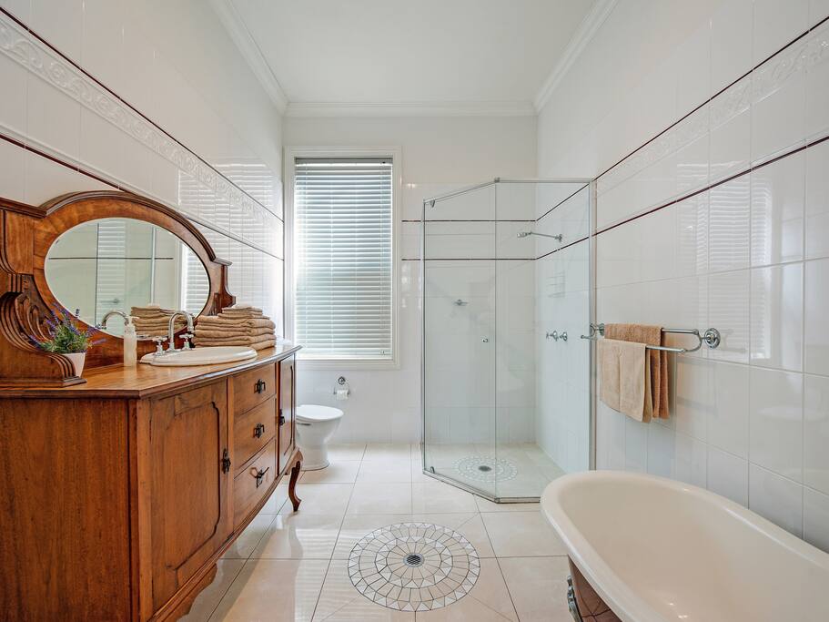Main bathroom with clawfoot bath & large shower
