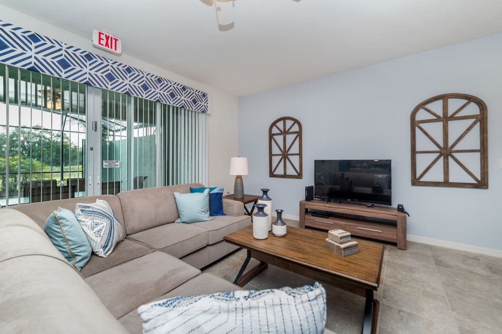 Living room with sectional sofa and flat screen TV