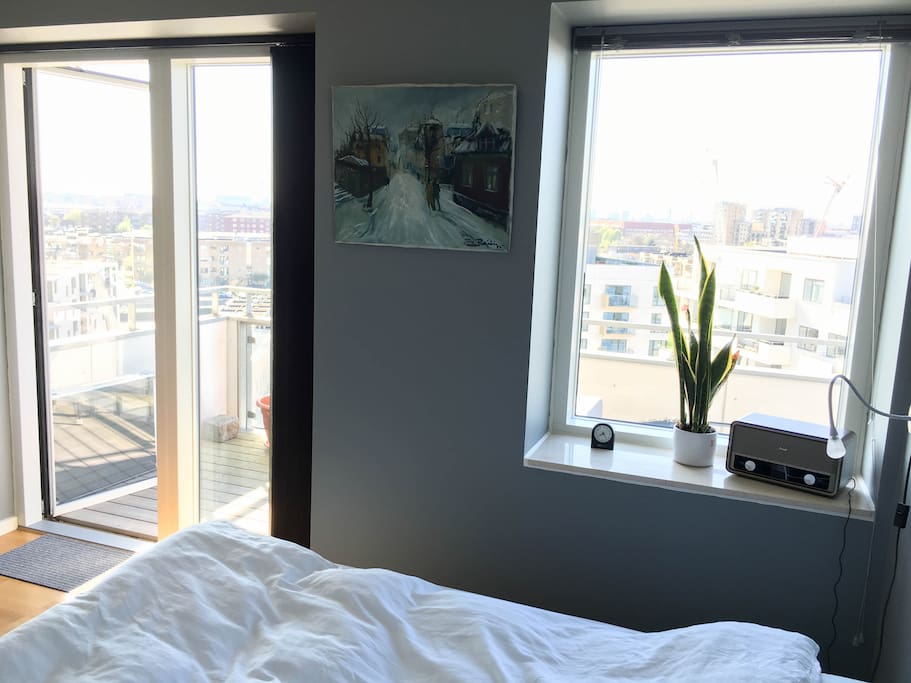The bedroom - with access to large balcony