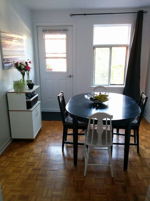 Dining room with access to front balcony.