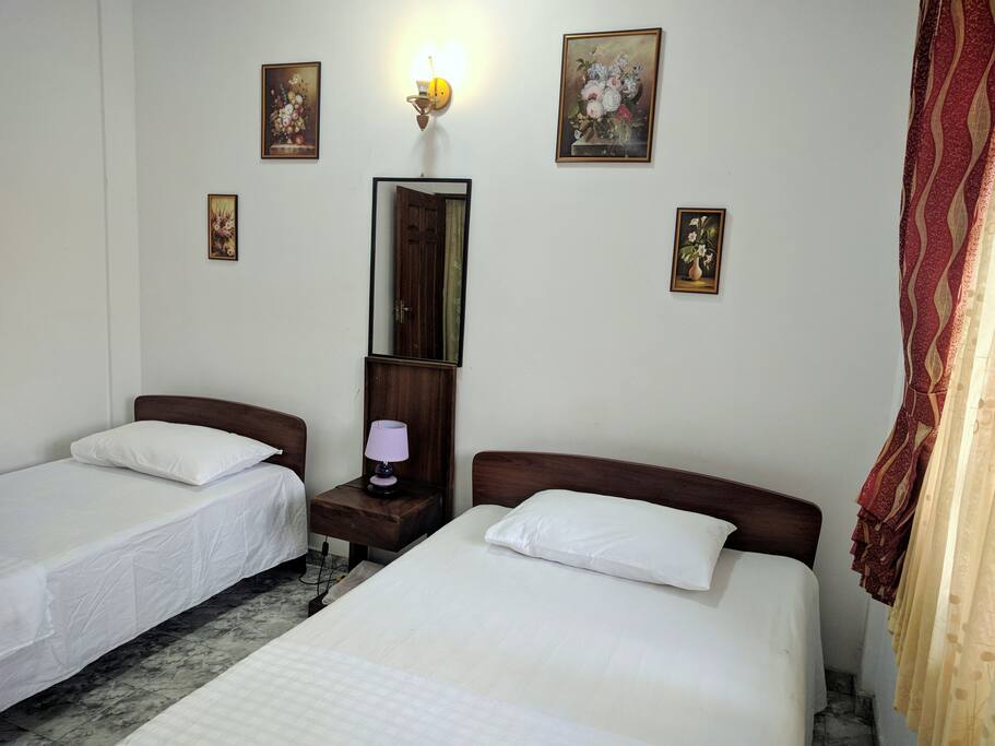 Bedroom with single bed and double bed ( Non A/C)