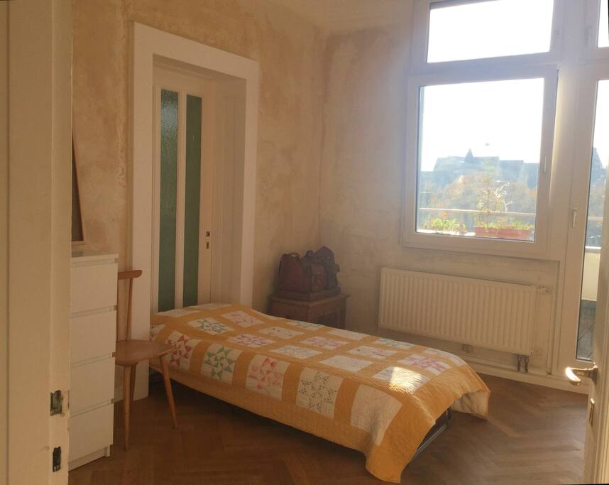 One bedroom with a balcony.