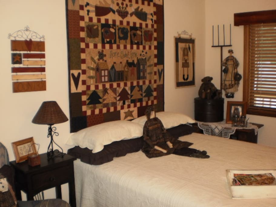 Guest bedroom 2 with queen bed, ceiling fan and tv/dvd player. Can be connected to guest bedroom 1 via the walk in robe.
