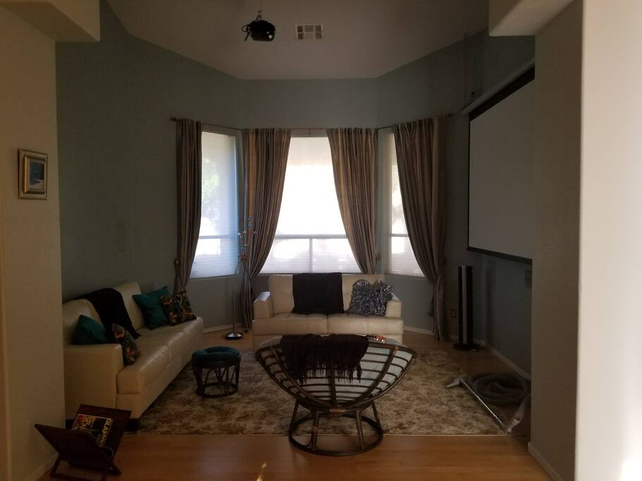 Watch Movies in a 150" HD Entertainment Room
