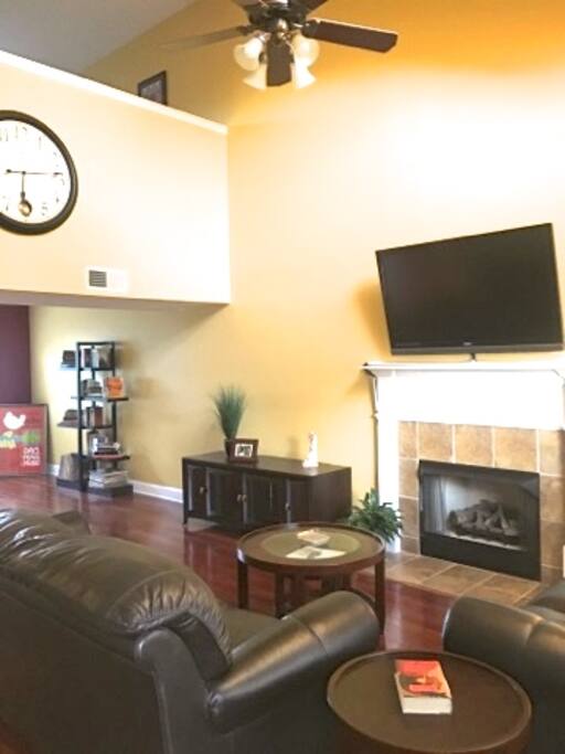 Cozy living room with mounted wall TV
